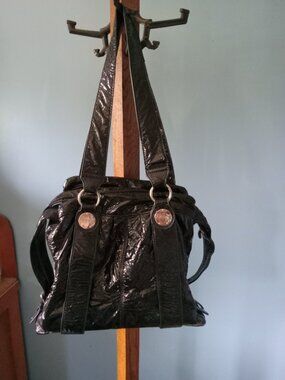 Medium to large size Foxy Jeans black purse in good used condition, logo faded